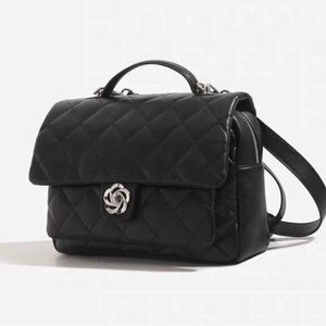 Elegant Black Quilted Handbag